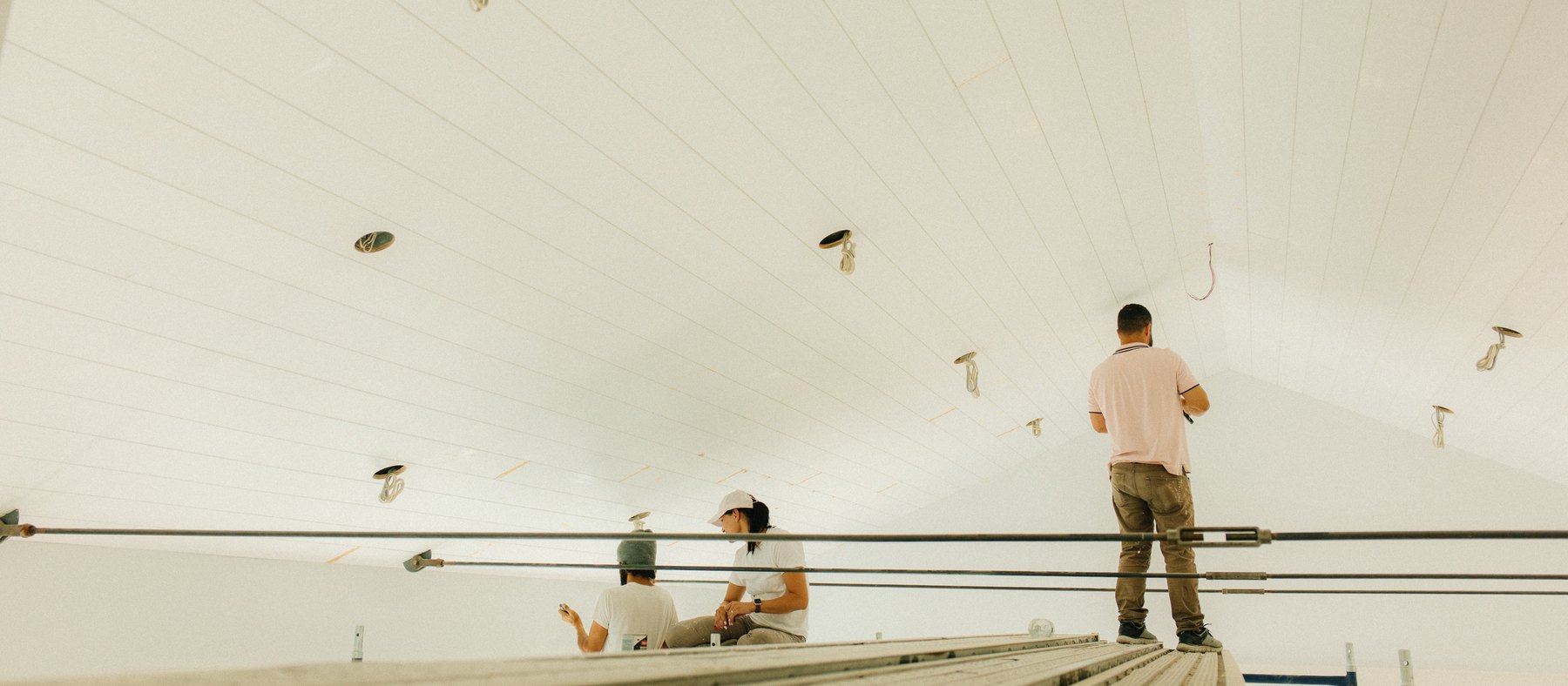 Pennywise Path — the ridge of the boarded ceiling, seen from a scaffold plank during the fit-out