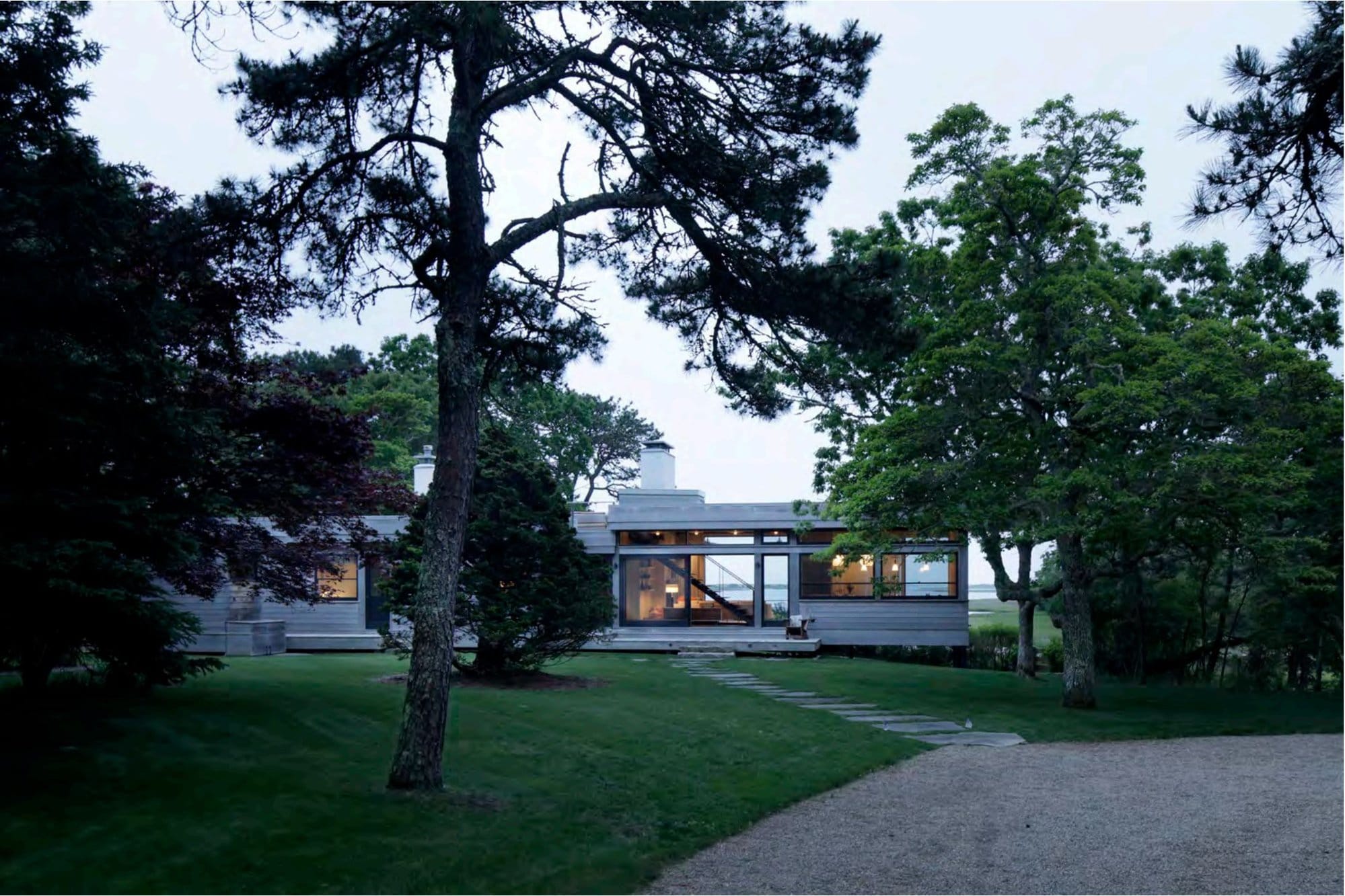 Pond House — the house among the trees at evening